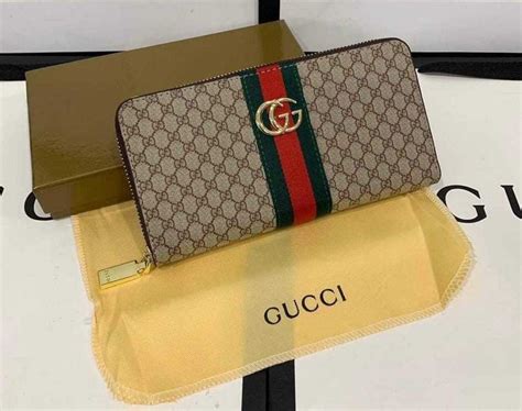 กระเป๋าสตางค์ Gucci ผู้ชาย ราคาถูก ซื้อออนไลน์ที่ 